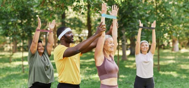 Retirees Taking Yoga Class from an Instructor